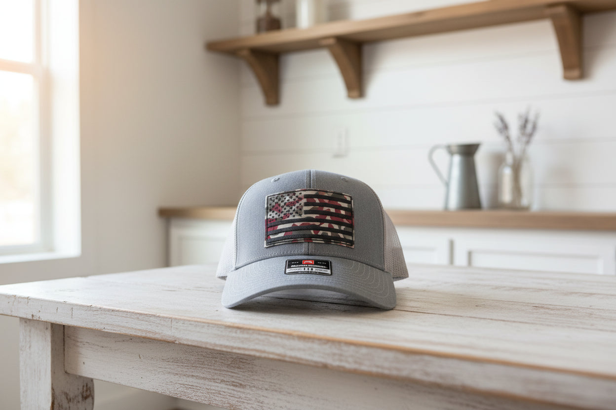 Gray trucker hat with American flag patch and Richardson logo
